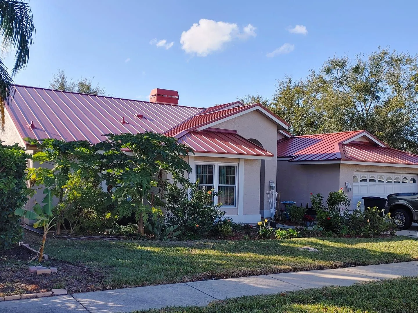 Florida home with a tile roof and attached garage near Sarasota