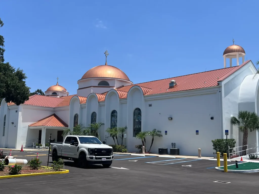 Domed building with a newly installed metal roof in Tampa
