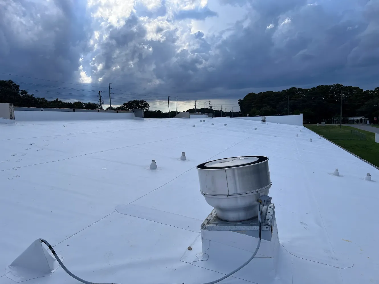 Flat commercial roof with rooftop equipment in Tampa